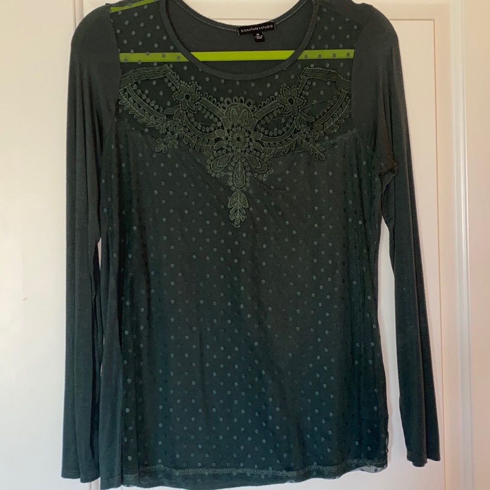 Long sleeve dark green shirt. Sheer mesh around the chest area. Size M